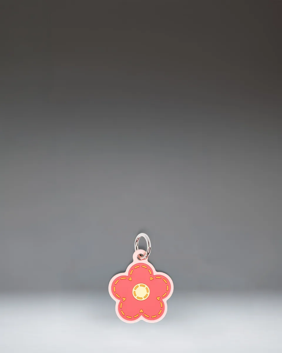 herschel-supply-daisy-bag-charm-pink-silicone-bag-accessory image 1