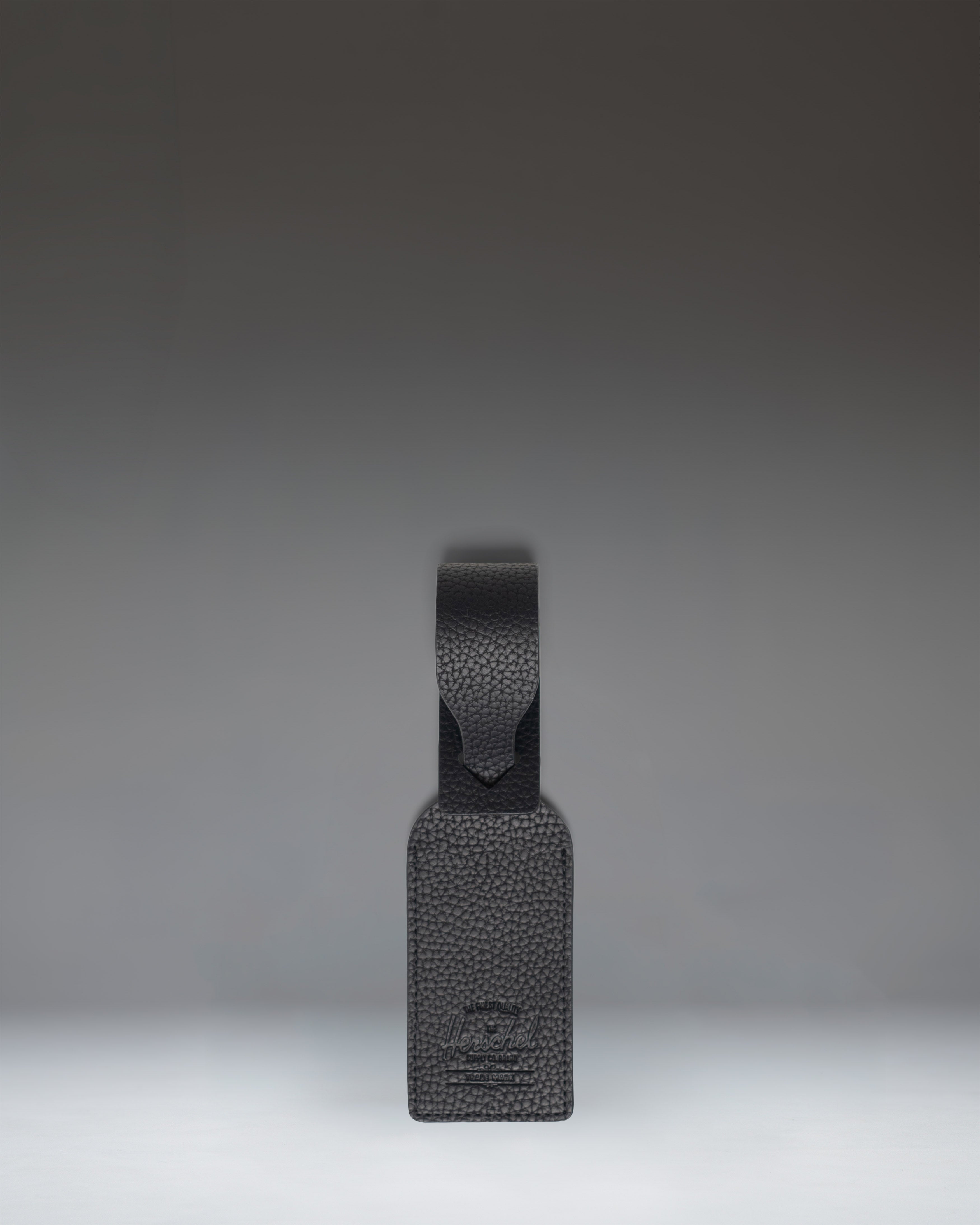 herschel-supply-luggage-tag-vegan-leather-pebbled-faux-leather-hidden-id-card image 1