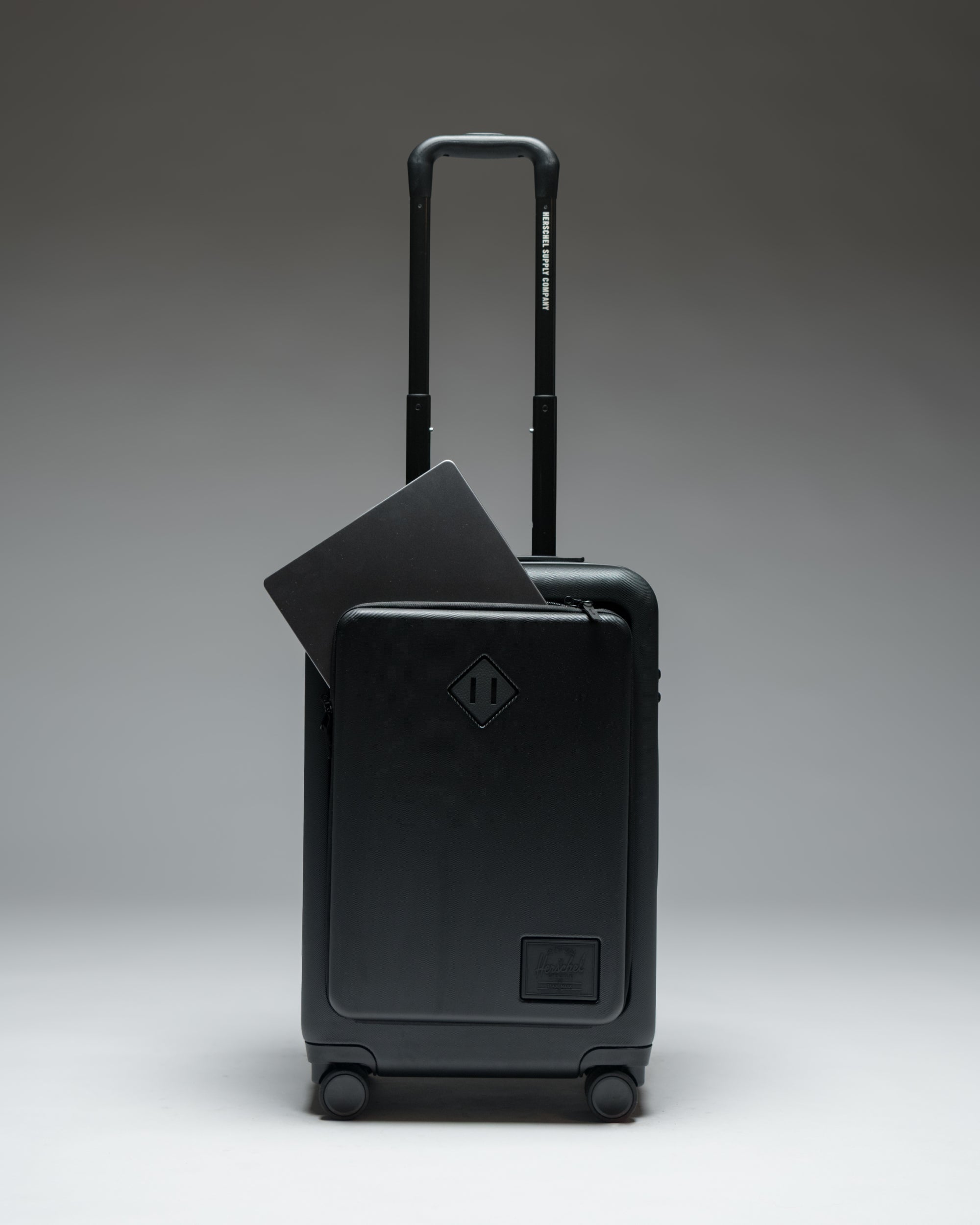 herschel-supply-heritage-hardshell-pro-large-carry-on-70-recycled-polycarbonate- image 1