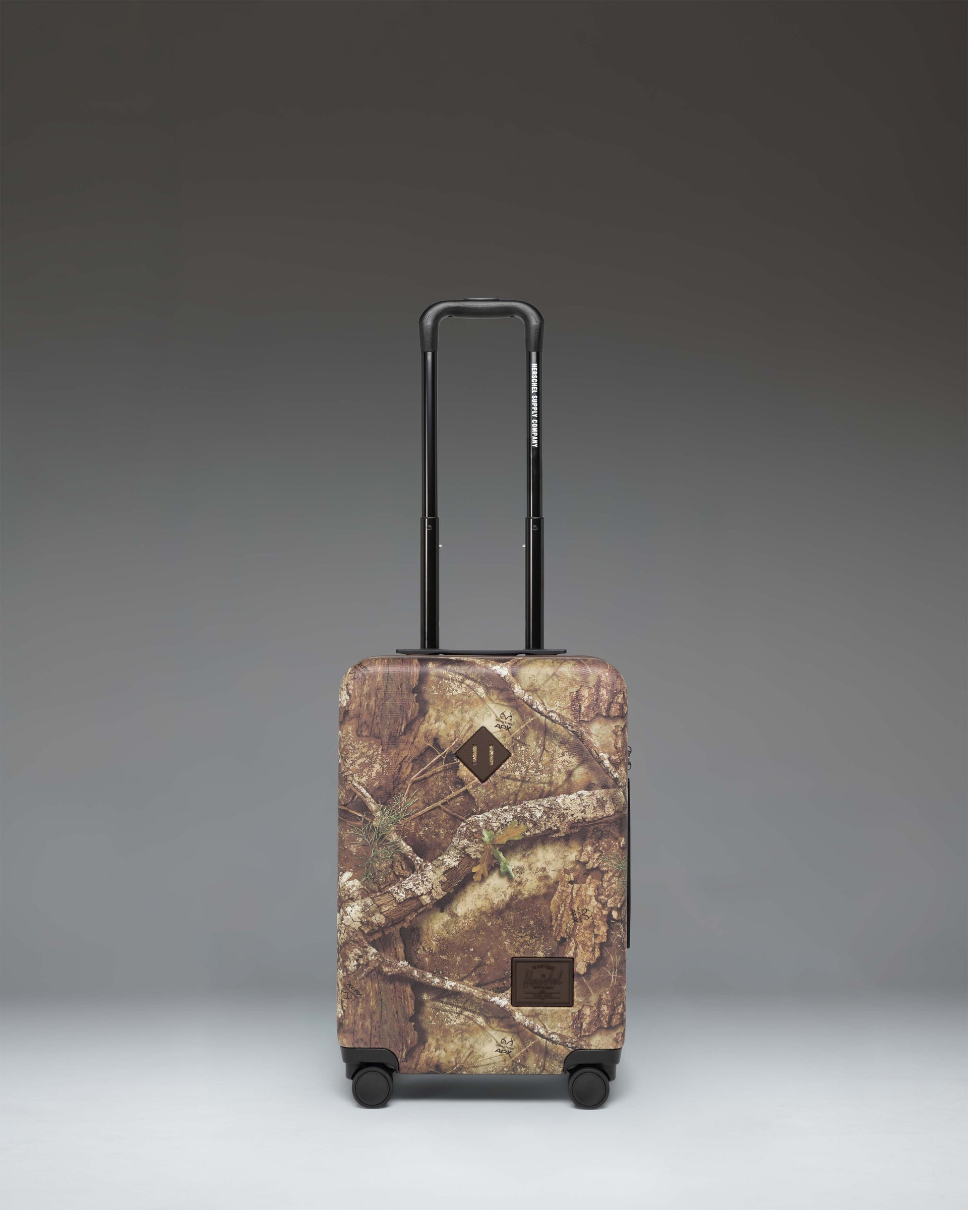 herschel-supply-heritage-large-co-luggage-with-realtree-apx-camo-carry-on-suitca image 1