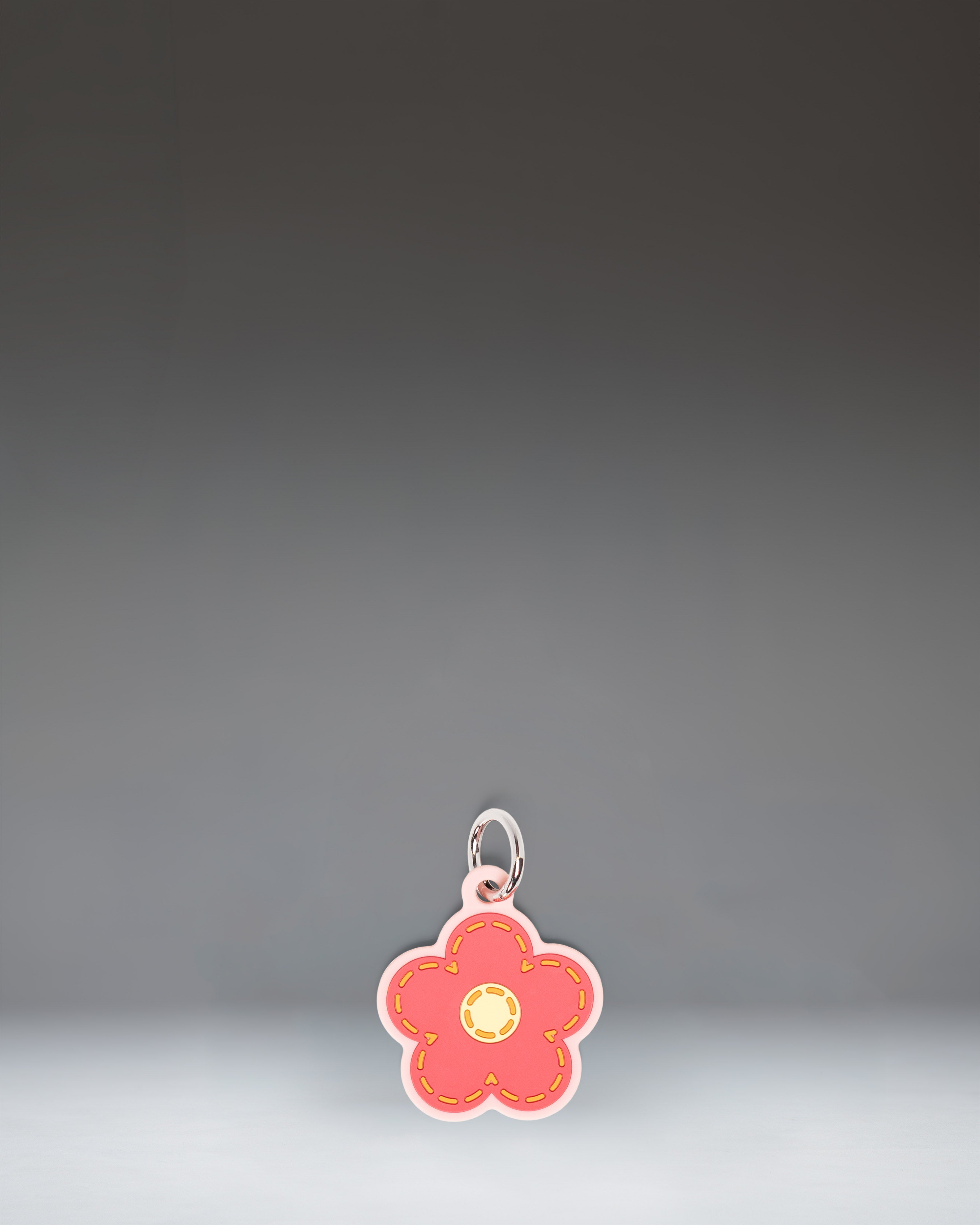 herschel-supply-daisy-bag-charm-pink-silicone-bag-accessory image 1