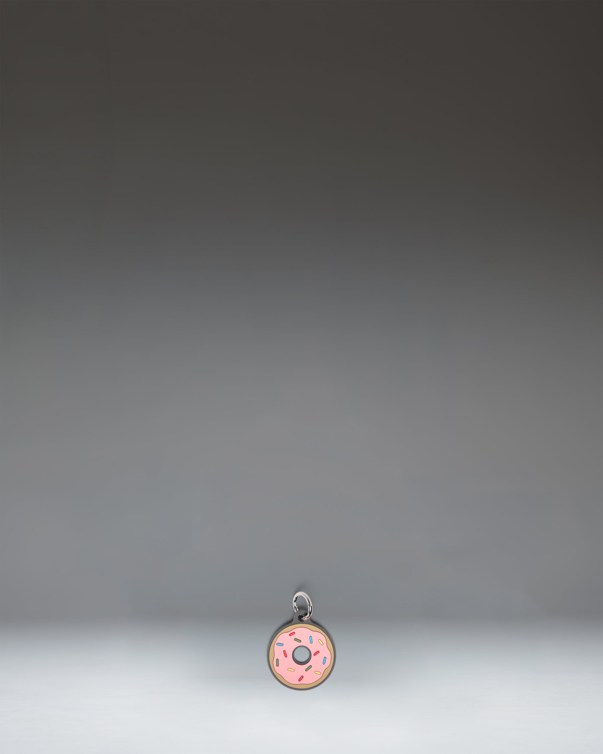 herschel-supply-donut-bag-charm-silicone-with-metal-keyring image 1